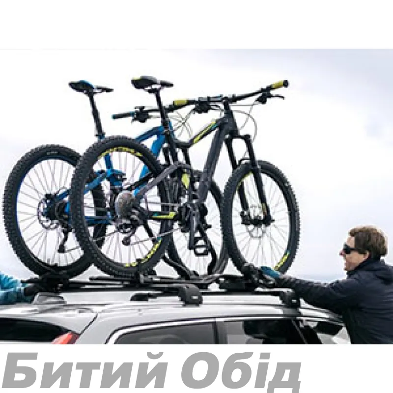 Установка автомобільного багажника Thule